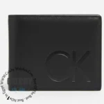 Black leather wallet with a subtle embossed CK logo on the front.