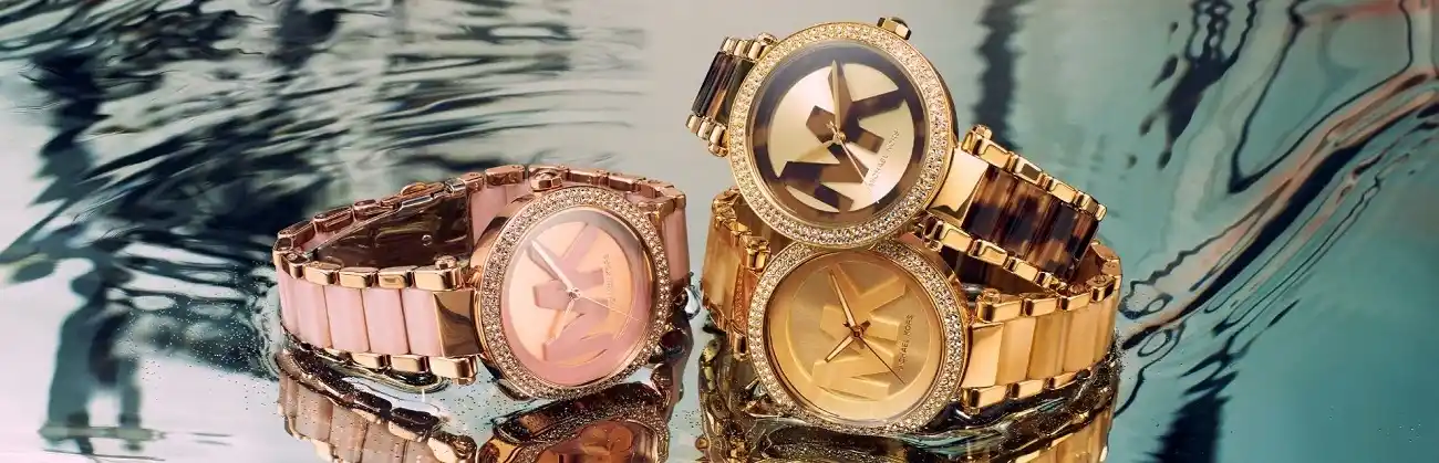 Two elegant Michael Kors watches displayed.