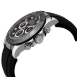 Close-up of a stainless steel Rolex-style chronograph watch with a black dial and black rubber strap.