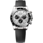 Rolex Oyster Perpetual Cosmograph Daytona watch with a textured silver dial, black subdials, and a black ceramic bezel with a rubber strap.