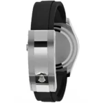 Side view of a silver stainless steel watch with a black rubber strap, featuring a deployant clasp with a Rolex crown logo.