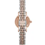 Back view of a two-tone wristwatch with rose-gold and silver linked bracelet.