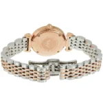 Back view of a two-tone stainless steel watch with rose-gold center links and a deployment clasp visible