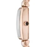 Rose gold women's wristwatch shown in side view with slim rectangular case and crown visible on the right side.
