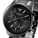 ar1452-emporio-armani-watch-men-black-ceramic-ceramica-4 Close-up of a black Emporio Armani Ceramica chronograph wristwatch with three subdials and a date window showing 08.