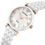 ar1486-emporio-armani-watch-ceramica-women-mother-of-pearl-white-dial-ceramic-strap-quartz-battery-analog-gianni-t-bar_4 Women's white ceramic watch with a rose-gold case and band links, mother-of-pearl dial, and Emporio Armani logo.