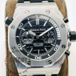 audemars-piguet-automatic-watch-balck-dial-rubber-strap-men-high-premium-quality_6 Close-up of an Audemars Piguet stainless steel diver's watch with a black textured dial and three subdials on a brown strap edge visible.