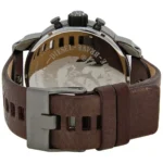 Back view of a Diesel wristwatch with a brown leather strap, metal deployant clasp, and chronograph crown/pushers visible on top of the case.