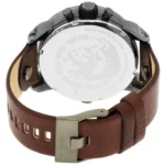 Rear view of a Diesel wristwatch with brown leather strap and brushed metal deployant clasp.