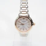 emporio-armani-ar-11643 Emporio Armani women's two-tone stainless steel watch with a diamond-studded bezel and rose-gold accents on a white background