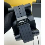 Close-up of a dark gray Hublot watch strap with a deployment clasp.