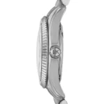 Side view of a silver Michael Kors wristwatch with a knurled bezel and crown.