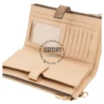 Beige leather wallet open to reveal a clear ID window, nine card slots, and a zippered coin pocket.