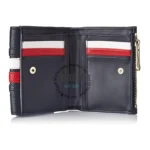 original-tommy-hilfiger-wallet-women-navy-blue-genuine-leather_9 Navy wallet opened to reveal card slots and a zippered pocket on the right side.
