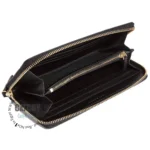 Black zip-around wallet opened to show multiple card slots, a zippered coin compartment, and cash slots in a black leather interior.