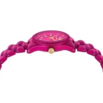 Side view of a bright pink analog wristwatch with a matching pink metal band and gold crown