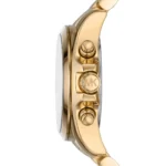 Gold-tone wristwatch side view with MK logo crown and pushers, showcasing polished metal bracelet