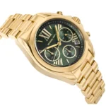 Gold-tone Michael Kors wristwatch with a green dial, Roman numerals, three subdials, and a date window on a metal bracelet.