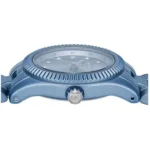 Side view of a blue wristwatch with a ridged bezel and crown, shown from the left.