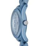 Blue metal wristwatch shown in profile with a ridged bezel and MK crown visible on the side.