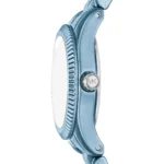 Blue stainless steel wristwatch shown in profile with a silver MK crown on the side (side view).