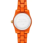Orange stainless steel wristwatch shown from the back with inscriptions: Limited Edition, Michael Kors, 1/500, and a signature, surrounding a polished case back.