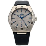 Omega Constellation wristwatch with brushed silver dial, blue hands and markers, and a Roman numeral bezel on a black leather strap.