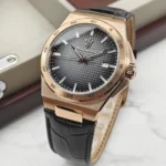 r8851153001-original-maserati-watch-men-black-dial-leather-strap_10 Rose gold wristwatch with a black textured dial, date window at 3 o'clock, and black leather strap.