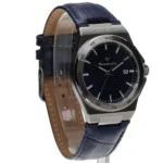 Maserati wristwatch with a dark blue textured dial, stainless steel case, and blue leather strap with a date window at 3 o'clock
