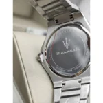 Maserati wristwatch back with logo and 'Italian Design' engraving on stainless steel bracelet.
