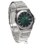 Stainless steel wristwatch with a green textured dial, silver hour markers, date window at 3 o'clock, and a metal link bracelet.