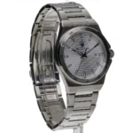 Stainless steel men's wristwatch with a textured silver dial, blue hour markers, date at 3 o'clock, and a metal band (Maserati logo).