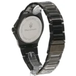 Back view of a black stainless steel Maserati wristwatch on a display stand, showing the circular case back with Maserati logo and 'Italian Design' engraving.