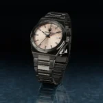 Stainless steel wristwatch with beige textured dial and date window at 3 o'clock.