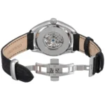 Stainless steel wristwatch with a black leather strap and a transparent case back showing the inner mechanical movement