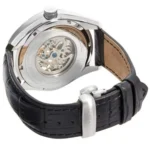 Back view of a silver mechanical wristwatch with an exhibition case back showing gears, on a black leather strap.
