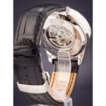 Maserati luxury watch with transparent case back showing the mechanical movement and a black leather strap